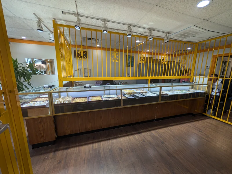 Gold jewelry showcases inside Kim Hoan Jewelry